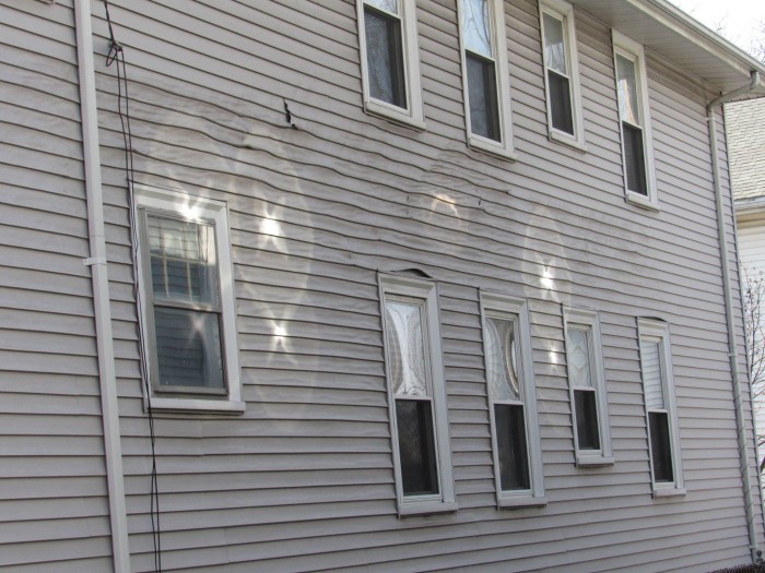 Melted vinyl siding