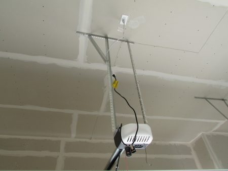 garage door opener plugged into extension cord