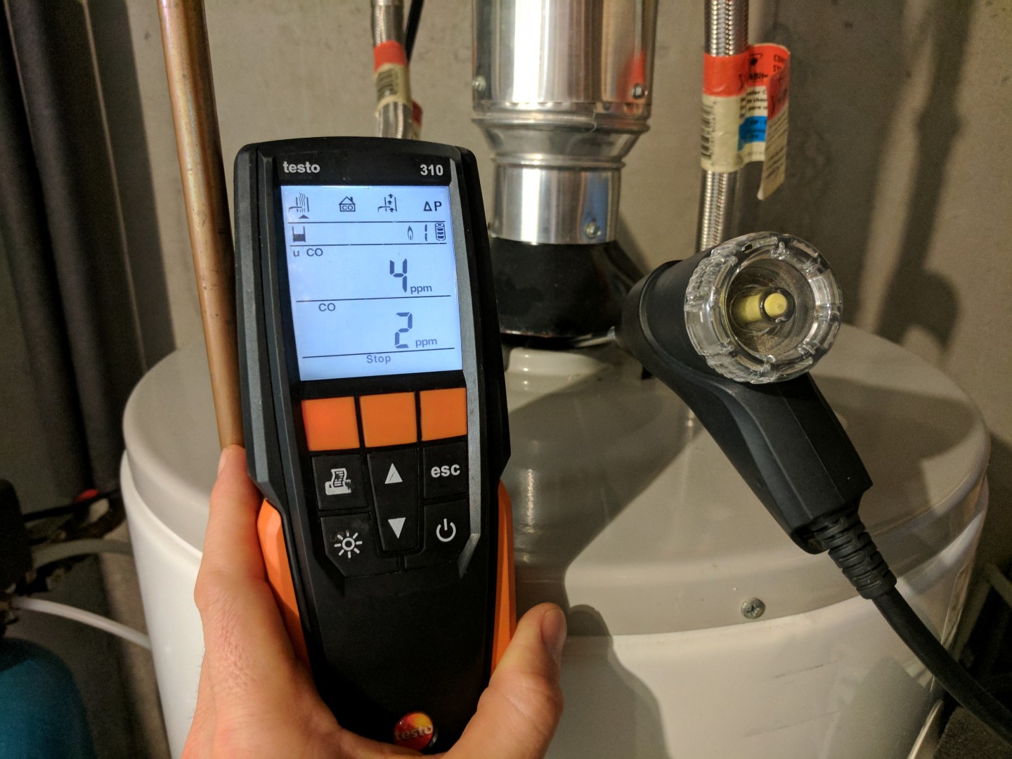 Water heater backdrafting: how to test for proper draft - Structure Tech  Home Inspections
