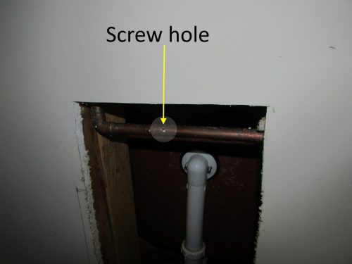 Screw hole in water line