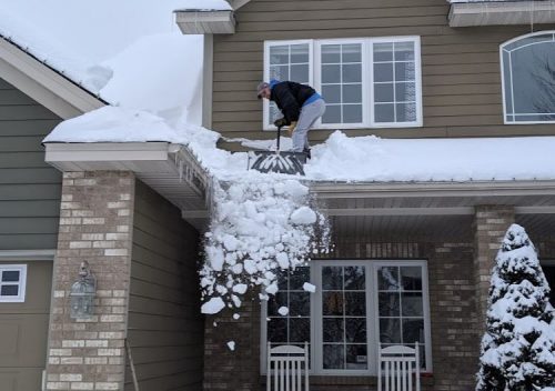 Shovel snow off roof