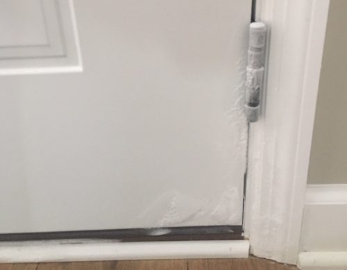 frost at door hinges